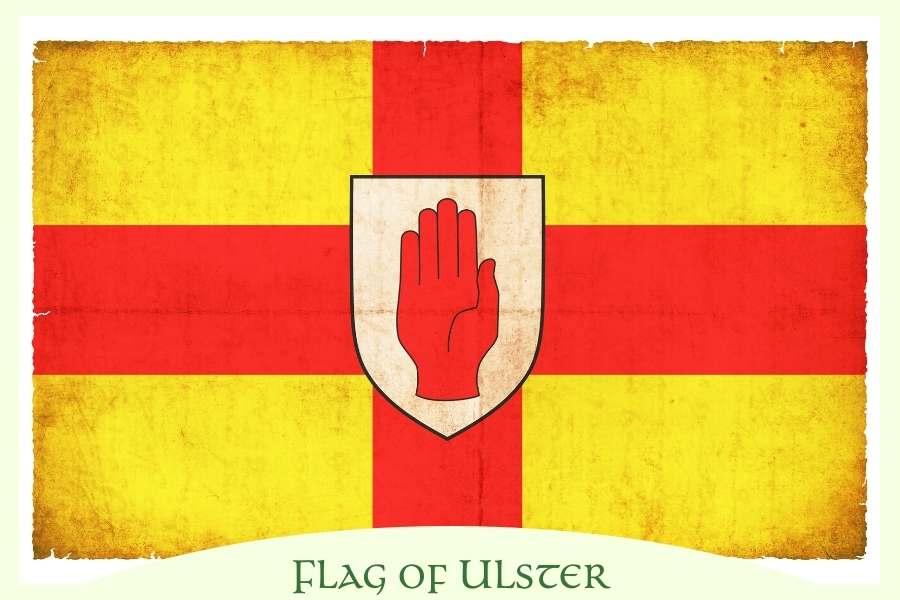 Flag for the province of Ulster with red hand in center | Irish American Mom Yellow flag with red cross and hand with text overlay