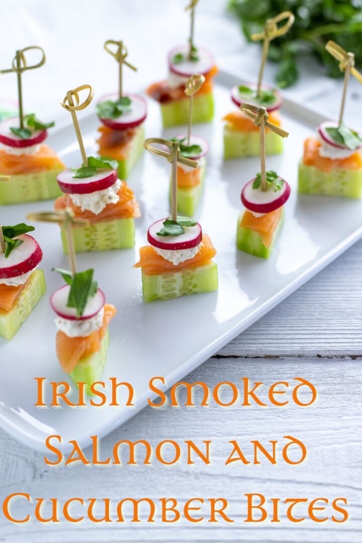 Text overlay on a tray of bite size salmon and cucumber appetizers