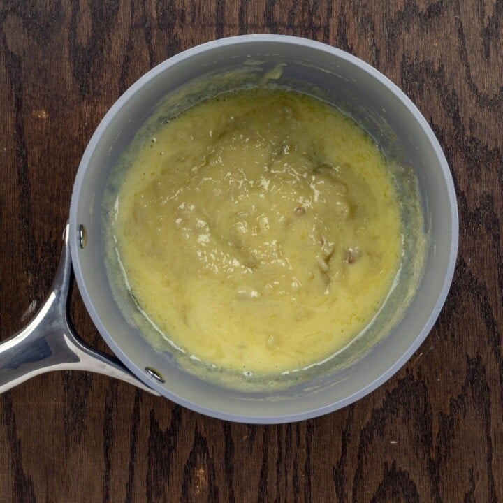 Mashed garlic and cream in a saucepan for stuffed mushrooms | Irish American Mom Mashed garlic and cream in a saucepan