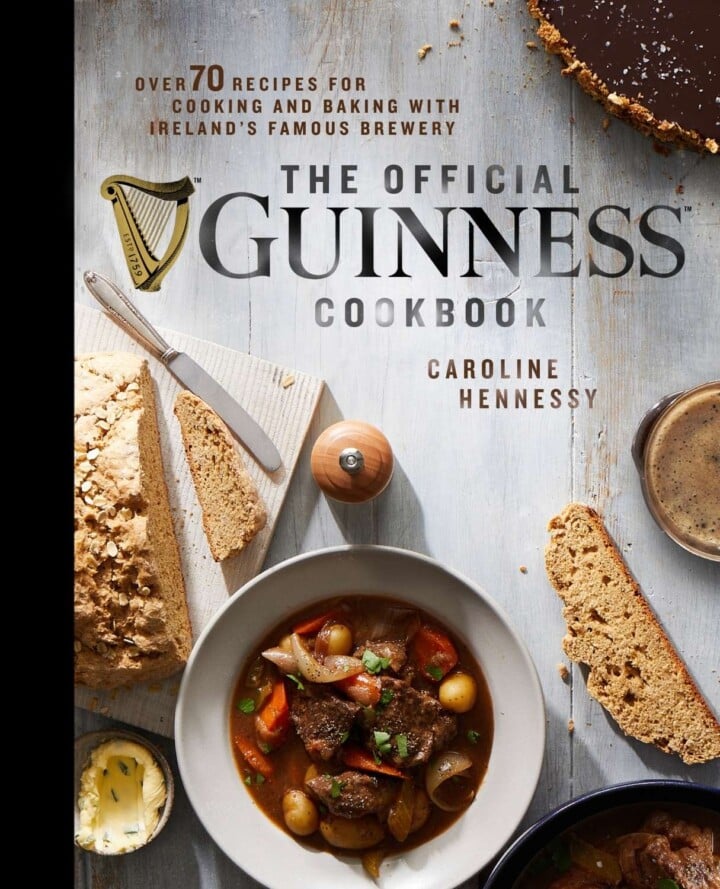 Cookbook Cover for The Official Guinness Cookbook | Irish American Mom Guinness cookbook cover with stew and bread and text overlay