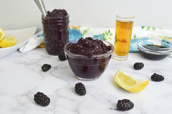 Blackberry jam with bourbon or whiskey | Irish American Mom Bowl and jar of blackberry jam with a shot of whiskey
