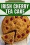 Round Irish cherry tea cake topped with red cherries and sliced into wedges, with a text banner promoting a traditional homemade baking recipe.