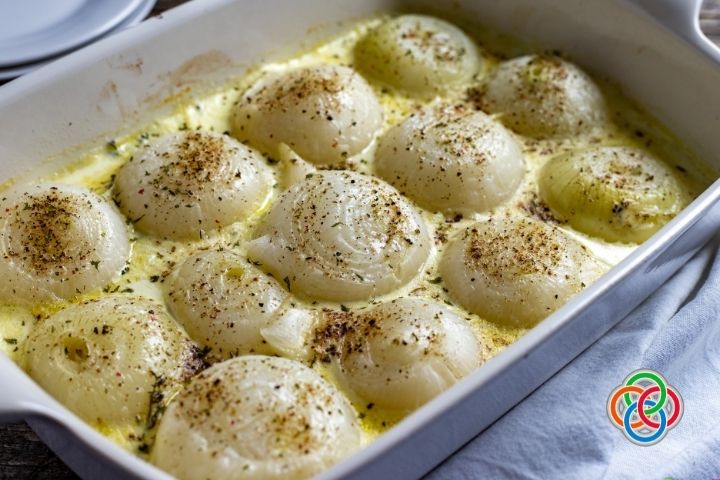 Baked creamed onions Irish style just out of the oven | Irish American Mom Onons baked in cream in a casserole dish