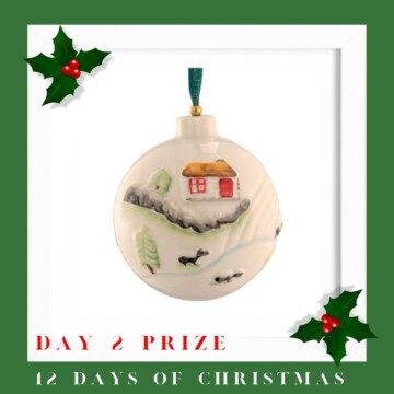 Christmas bauble with text and holly sprigs