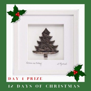 Framed bronze tree with holly and text