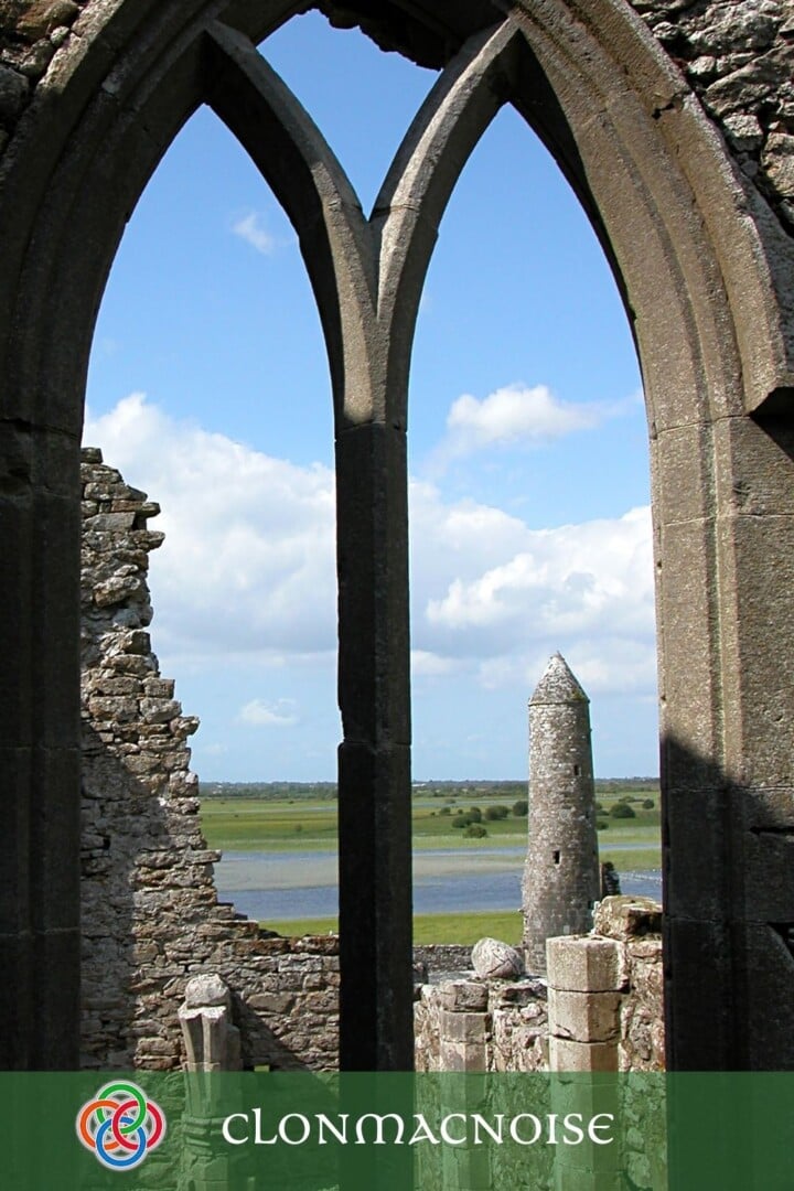 Stone arch window with stone tower visible plus text