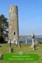 Round tower with gravestones plus text banner