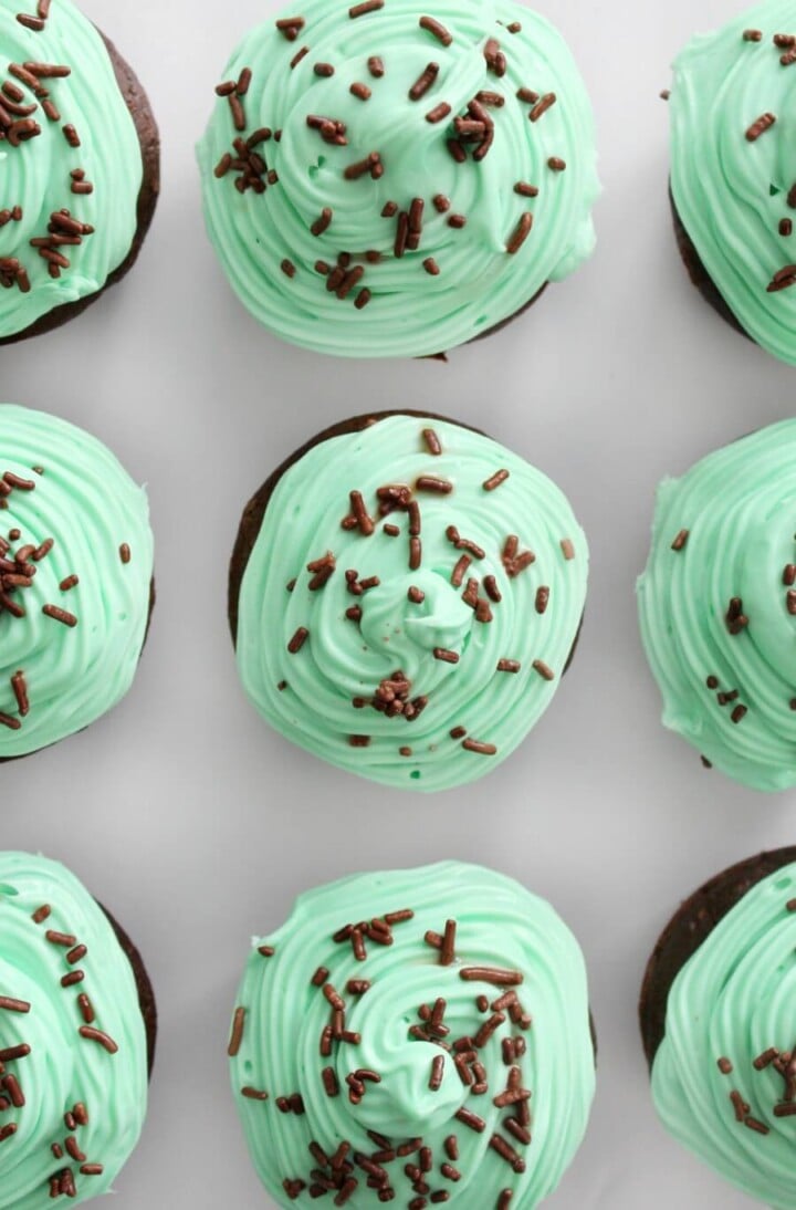 Mint chocolate cupcakes gluten free vegan recipe | Irish American Mom Green frosted cupcakes with chocolate sprinkles