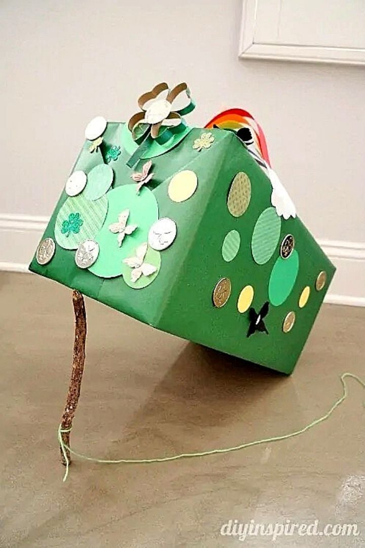 Large decorated green box propped on a stick as a trop for a leprechaun | Irish American Mom Large decorated green box on a stick