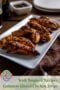 Close-up of Guinness glazed chicken strips on a white platter with a glossy caramelized glaze, labeled Irish Inspired Recipes Guinness Glazed Chicken Strips with Irish American Mom branding.