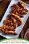 Plate of caramelized Guinness glazed chicken tenders on a white platter with Irish American Mom branding and the title Saint Patrick’s Day Guinness Glazed Chicken Tenders.