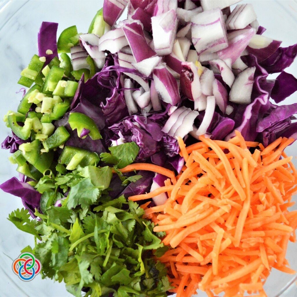 Easy Healthy Red Cabbage Slaw Recipe 3 Chopped vegetables in a bowl