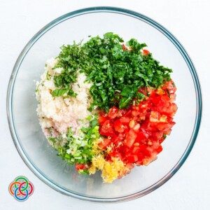 Tabbouleh salad ingredients in a bowl