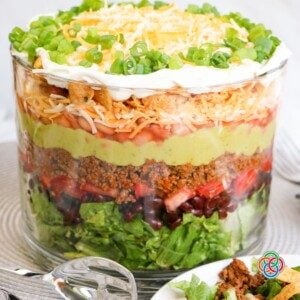 Layered taco salad in a trifle bowl