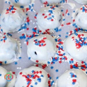 Adding sprinkles to white chocolate covered truffles