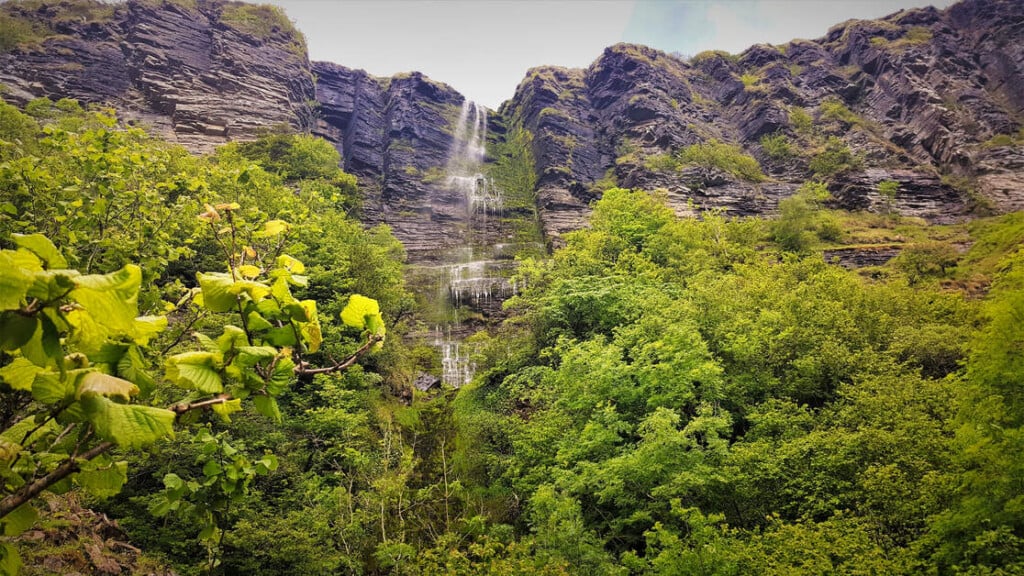 Devil's Chimney, Co Sligo Courtesy of Failte Ireland | Irish American Mom Waterfall on the side of a mountain