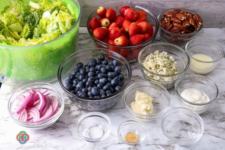 Ingredients for a layered blueberry salad | Irish American Mom Salad and fruit ingredients in bowls