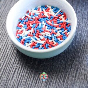 Bowl of red whtie and blue cake sprinkles