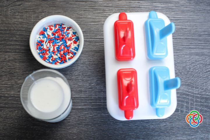 Simple patriotic popsicles (1) | Irish American Mom Popsicle mold with coconut milk and sprinkles