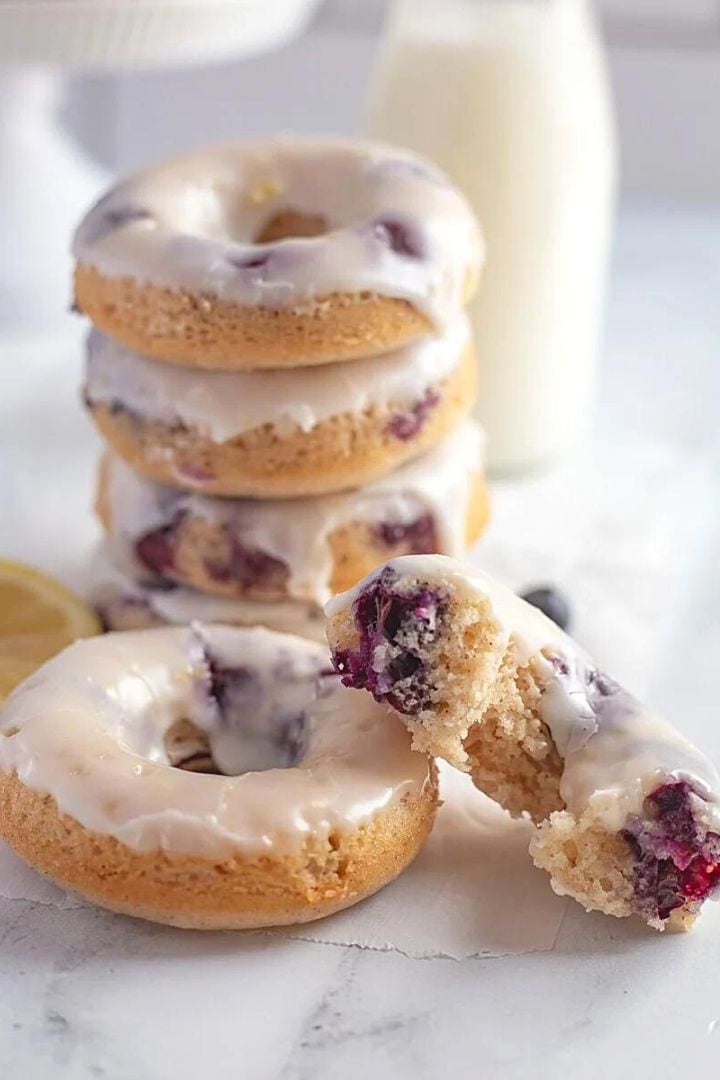 Stack of berry donuts with glaze