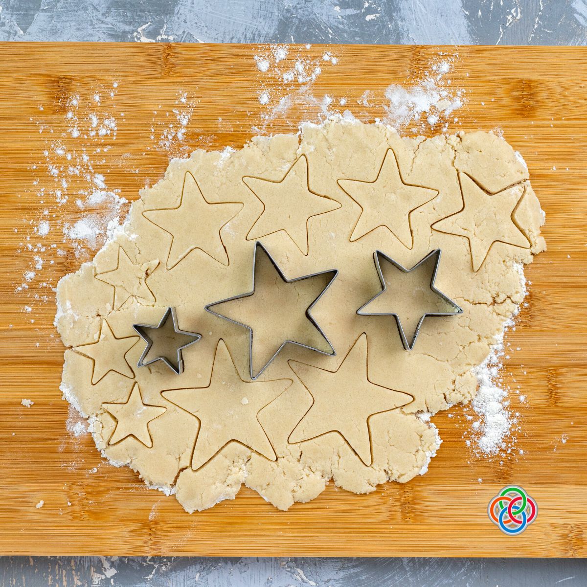 Cutting star cookies from rolled dough | Irish American Mom Cutting star shapes from rolled out cookie dough