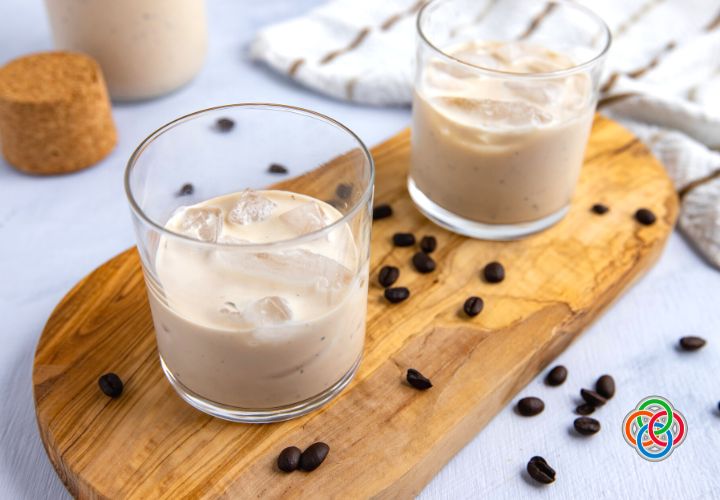 Homemade Irish Cream Recipe | Irish American Mom Two glasses of Irish cream with logo