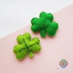 Two felt plush shamrock shapes