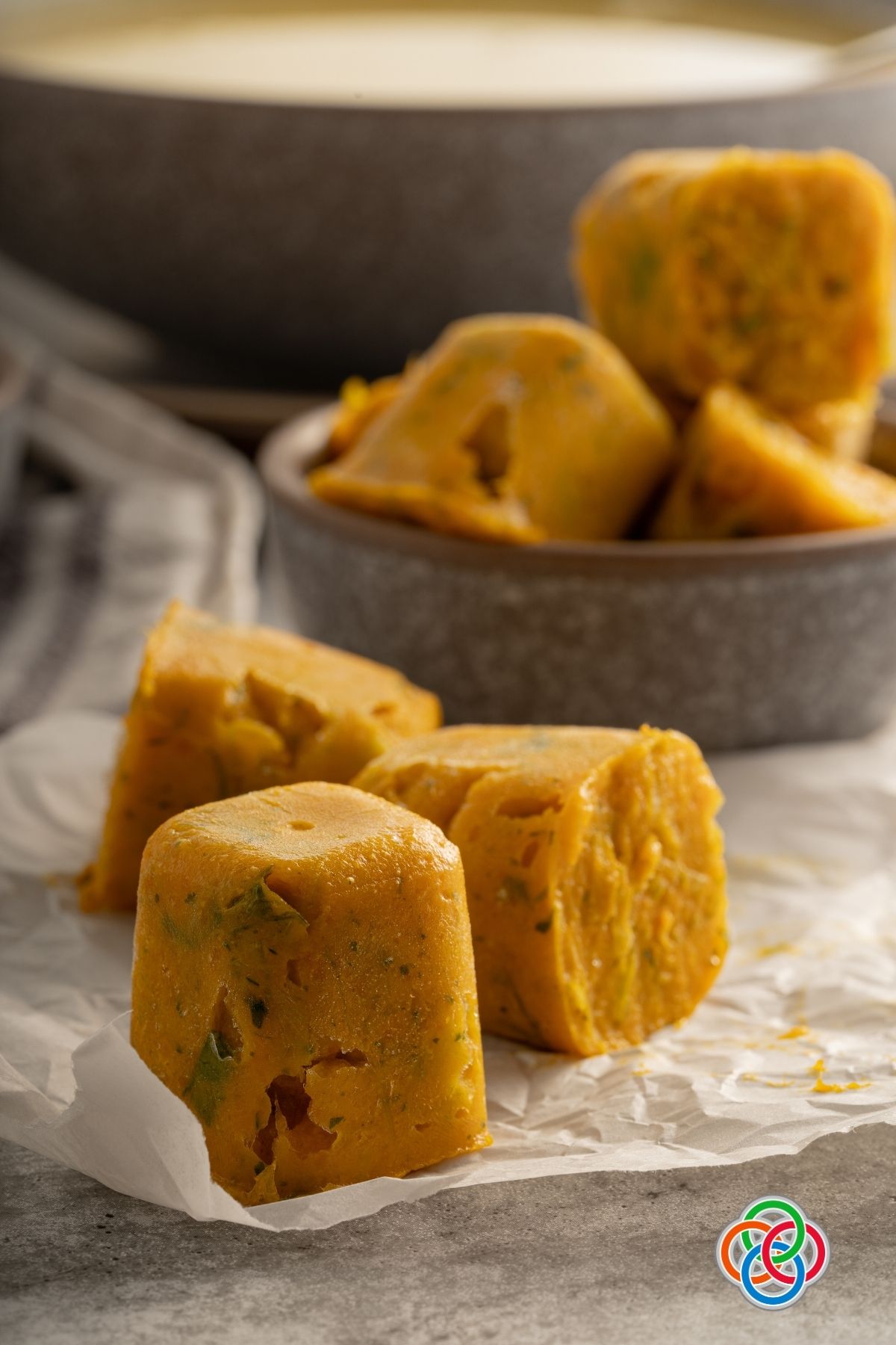 Homemade vegan vegetable stock cubes for soup | Irish American Mom Stock cubes on wax paper and ina bowl
