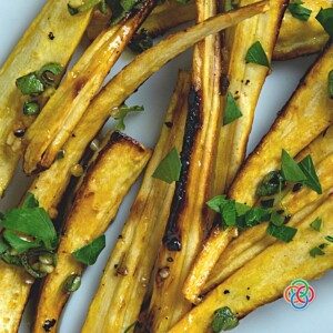 Close up of roasted parsnip strips