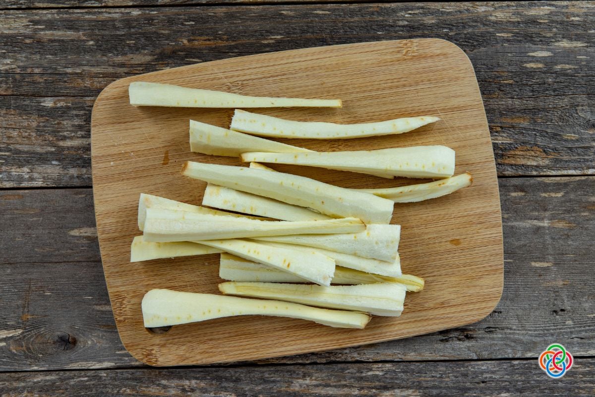 Peeled and sliced parsnips on a cutting board | Irish American Mom Sliced parsnips on a cutting board