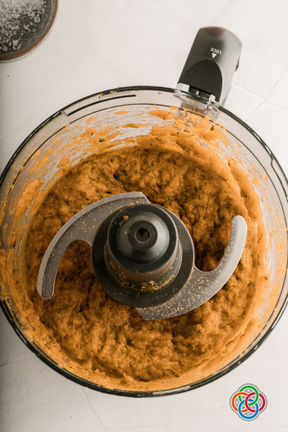 Smoothened veggie mixture in a food processor for homemade vegan vegetable stock cubes | Irish American Mom Making a smooth vegetable paste using a food processor