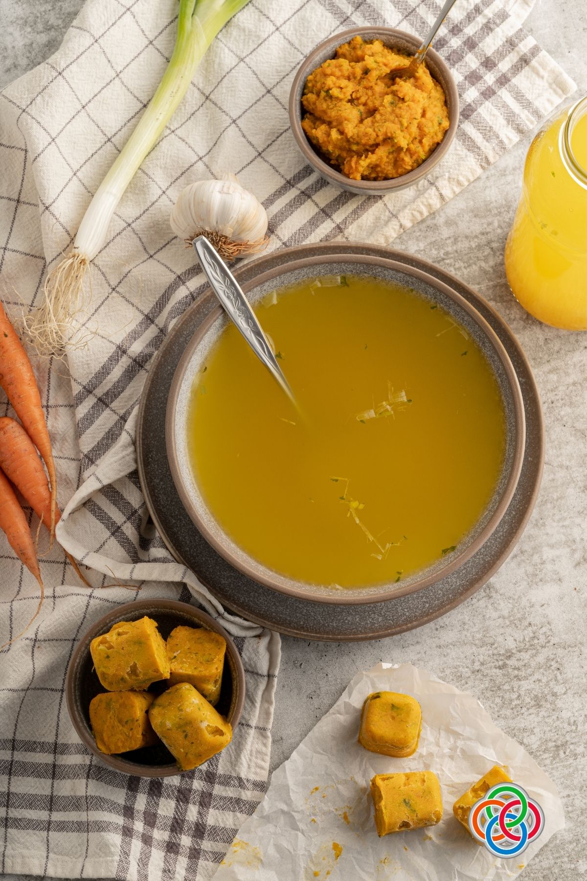Vegan vegetable stock cubes with added water | Irish American Mom Vegetable stock in a bowl with stock cubes