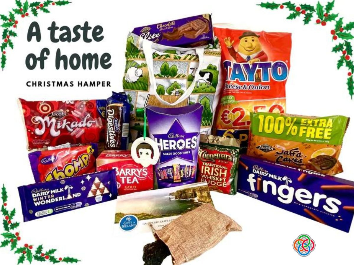 A taste of home Christmas Hamper from Gifts of Ireland | Irish American Mom Food hamper with holly banners and text
