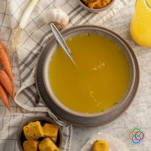 Bowl of stock with spoon