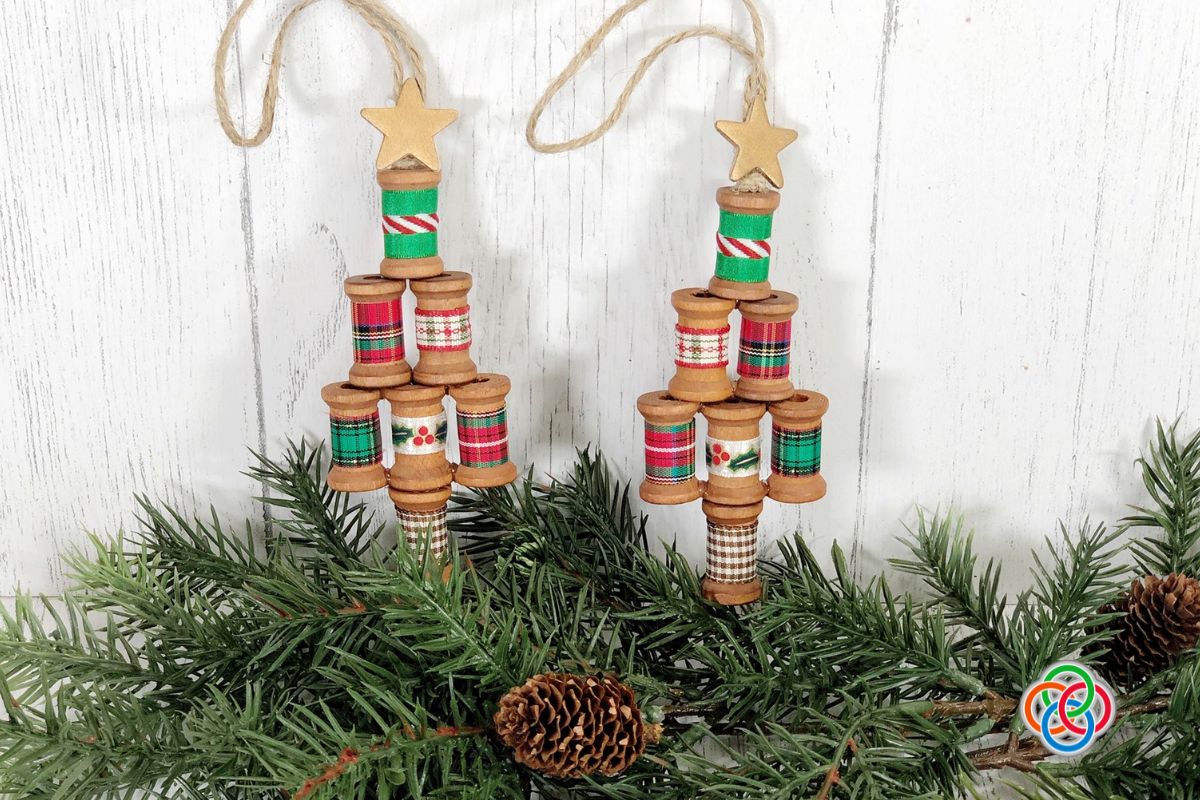 Crafty wooden spool Christmas tree ornaments | Irish American Mom Two wooden spool Christmas tree Ornaments with twine loops
