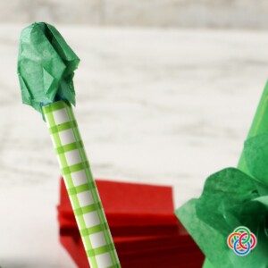 Tissue paper folded over the end of a pencil.