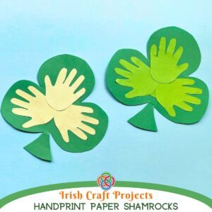 Paper shamrocks with text banner