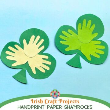 Paper shamrocks with text banner