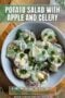 Potato salad with apples and celery in a creamy dressing, garnished with chopped green onions in a white bowl plust text banner.