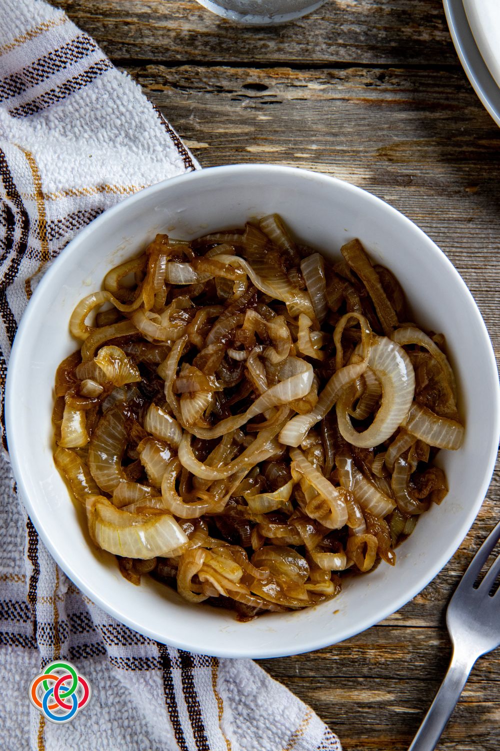 Bowl of fried onions with logo