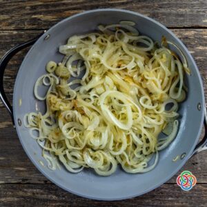 Frying onions in a skillet