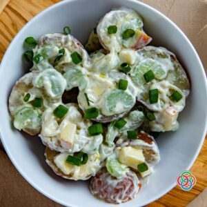 Apple celery and potato salad in a bowl
