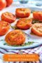 Roasted tomato halves with text banner