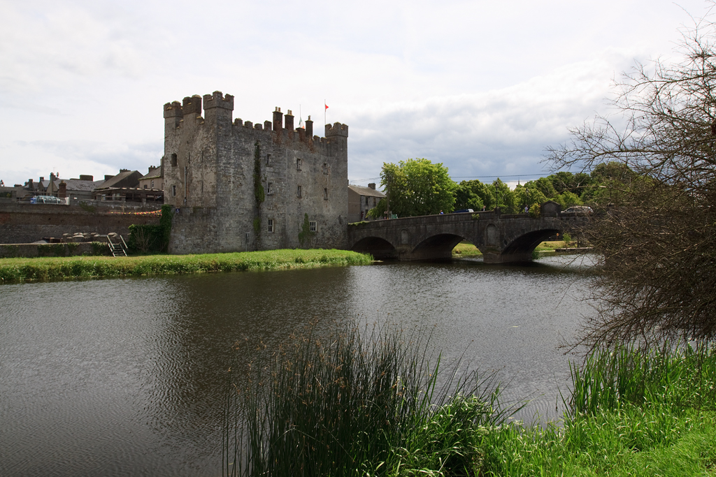 Castle by a river and a bridge
