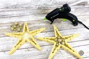 Wooden Christmas star craft with glue gun