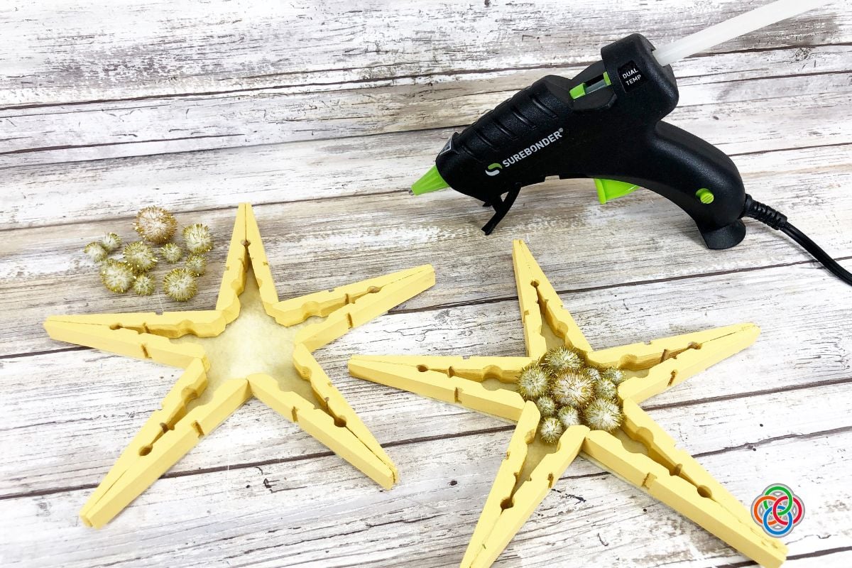 Wooden Christmas star craft with glue gun