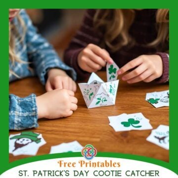 Children sitting at a wooden table playing with a St. Patrick’s Day themed cootie catcher decorated with shamrocks, with printable cards and Irish American Mom branding promoting a free printable activity.
