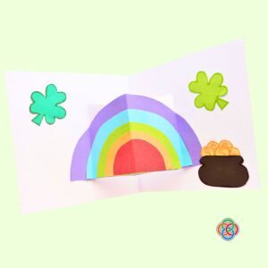 Glue the shamrock leaves inside the card for Pop Up Rainbow Card Craft | Irish American Mom