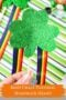 Child holding a glittery green shamrock wand with rainbow ribbon streamers, featuring the text “Irish Craft Tutorial Shamrock Wand” and Irish American Mom branding.