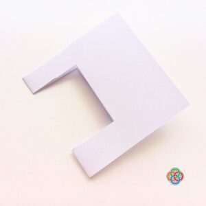 Pushing folded piece inwards for Pop Up Rainbow Card Craft | Irish American Mom